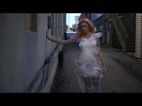 A black and white photo shoot behind the scenes