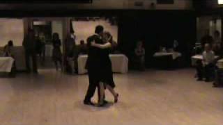 Eilecia Bovard and Julio Bassan performing tango