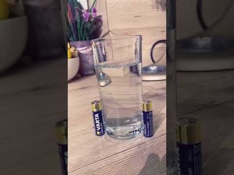 Experiment with two batteries and a glass of water #shorts