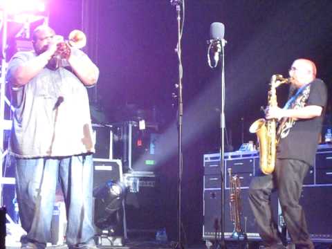 Jeff Coffin playing two saxophones