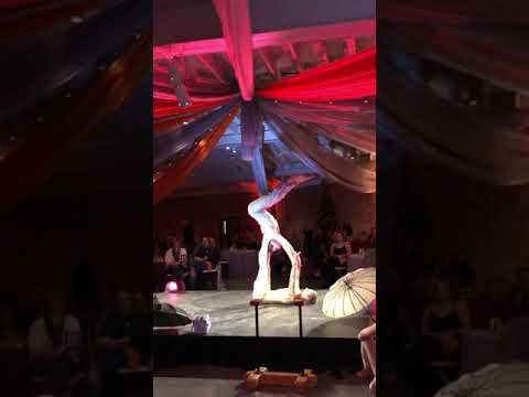 Contortionist at carnival themed corporate event