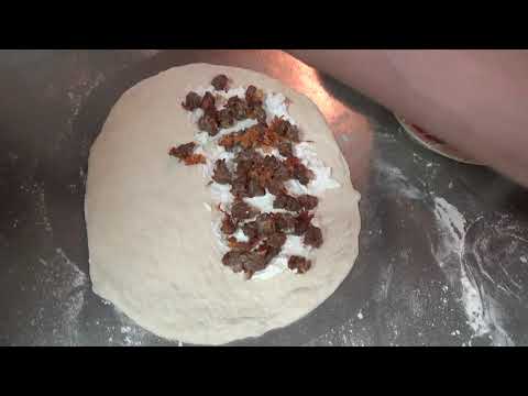 Calzone with Italian Sausage and Peppers