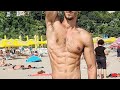 Muscle man shows All his BODY at the beach