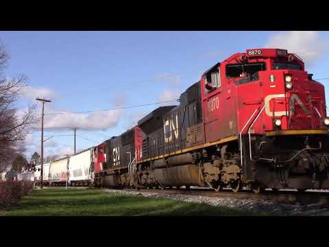 Friendly Engineer on a Decent Size CN Train 407 thru Downtown Moncton, NB