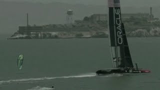 Oracle Team USA challenged by the waterman Kai Lenny