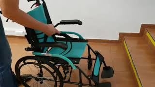 Silla de Ruedas en Aluminio con Apoyabrazos Abatibles y Reposapies Elevables y Ajustables.