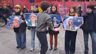 Il video del corteo contro Christine Lagarde a Bologna: slogan anti-Meloni, imbrattate foto con v...