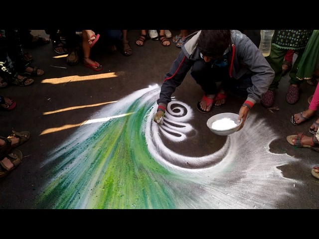Peacock rangoli design street art by rohit kambe