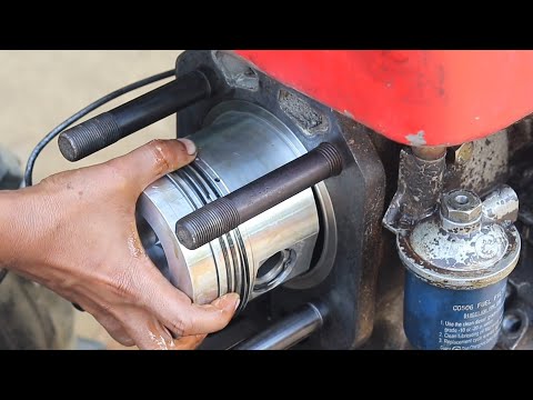 Engine repair.| Cylinder liner & piston install of 20-hp China diesel engine.