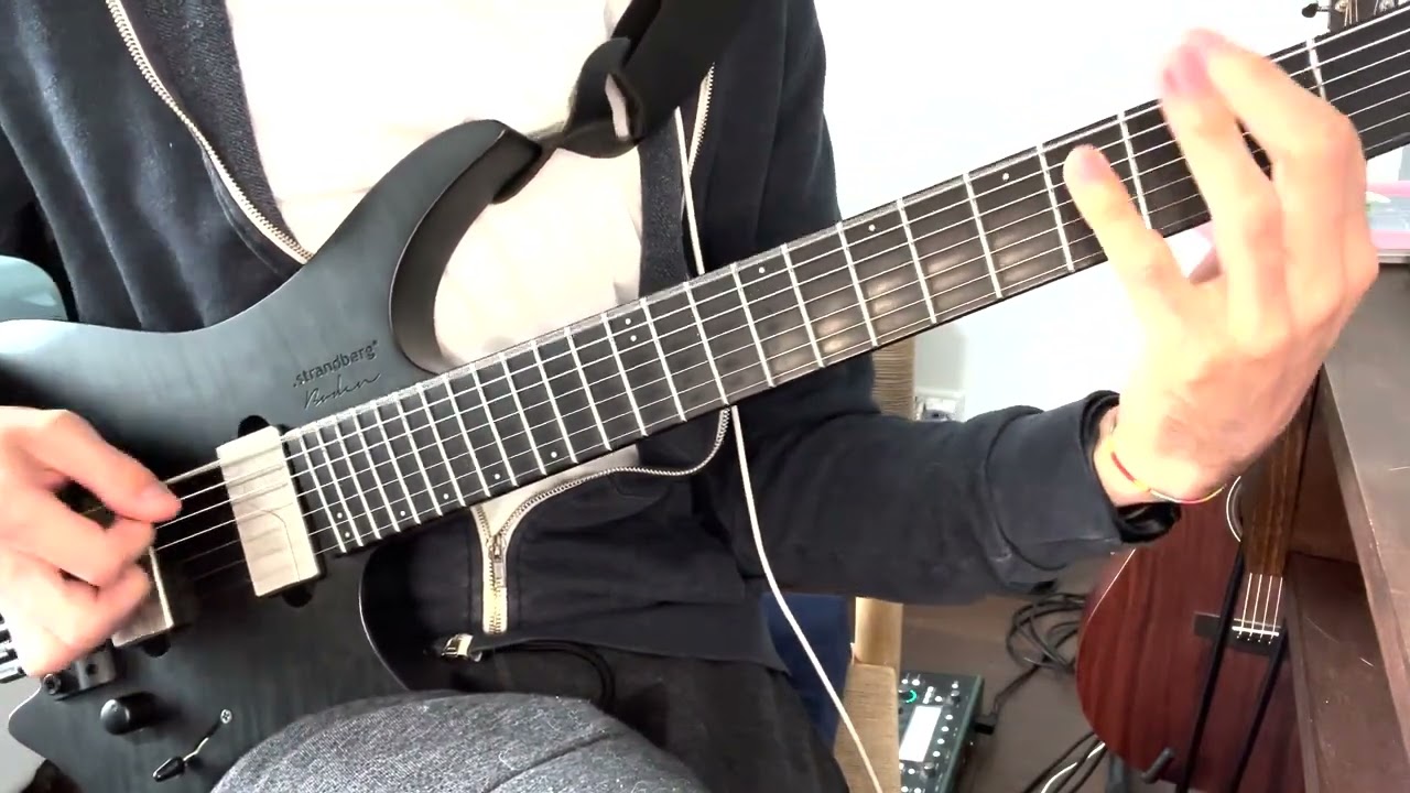 Seven-string guitar being played for the Hybris intro riff by Atomic Symphony