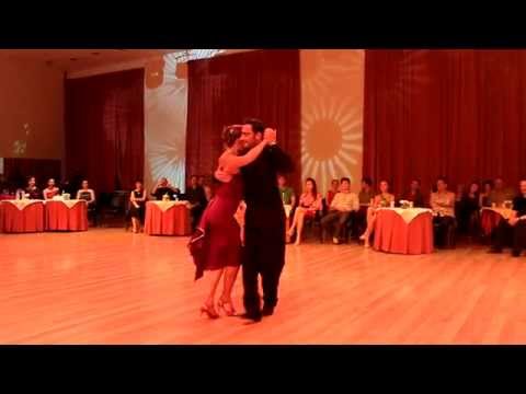  Fausto Carpino  and  Stephanie Fesneau  are  dancing  to  a  tango  or  milonga  at  Kiev International Tango Festival  in  2014