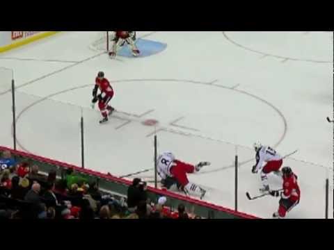 Sergei Gonchar hipcheks Maksim Mayorov