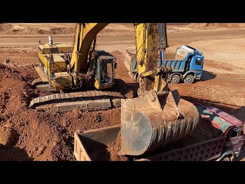 Caterpillar 365C Excavator Loading Mercedes & MAN Trucks