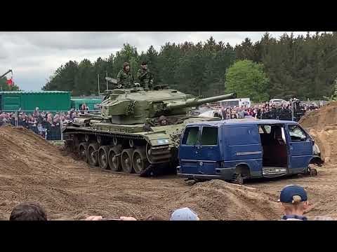Centurion tank crushes cars