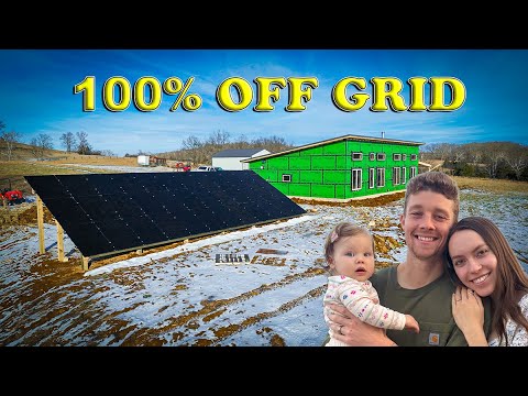 Off-grid ground-mounted solar array in a snowy field