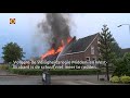 Vlammen sloegen metershoog uit het dak van een schuur in Waspik en er ontstond veel rook.
