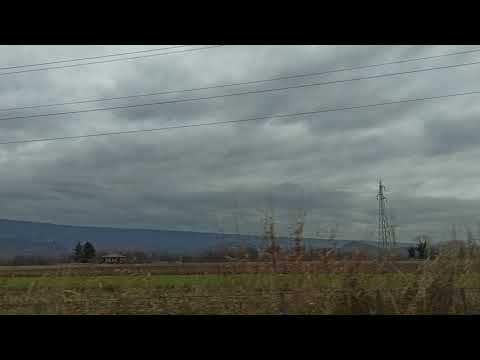 Serra d'Ivrea and Castle of Montalto Dora, near Ivrea, Torino province, from the A5 north, 01/12/21