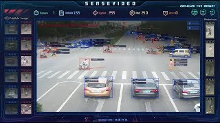 Experts believe this surveillance video, which shows a Chinese street intersection, uses artificial intelligence and deep-learning for face, body, and behavioral recognition. However, BuzzFeed News couldn’t independently verify that the video was created by SenseTime Group as shown in the video.