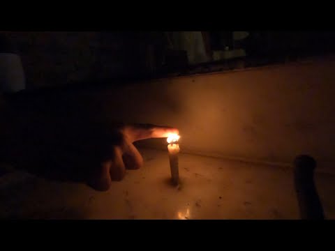 putting finger inside fire in super slow-mo