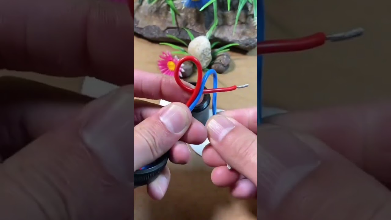 the process of installing cables in the lamp housing so that they are stronger and do not loosen