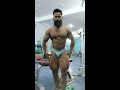Vineet Kala bodybuilding contest preparation posing routine after workout in gym.