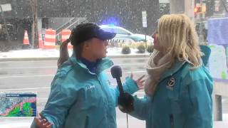 Meteorologists Eileen Whelan and Lauryn Ricketts have a little fun in the snow