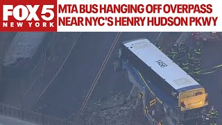 MTA bus hanging off overpass near NYC&#39;s Henry Hudson Parkway