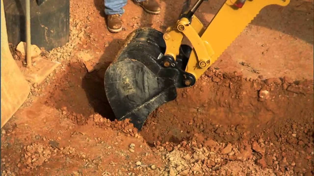 Cat® Backhoe Attachment at Work