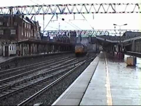 37521 storming north through Crewe. February 2002.