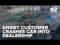 Sandy dealership responds after angry customer crashes car through showroom