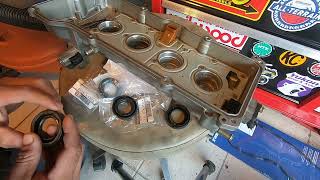 Nissan Sentra 1.8L Valve Cover Gasket, Spark Plug Tube Seals, & Spark Plugs
