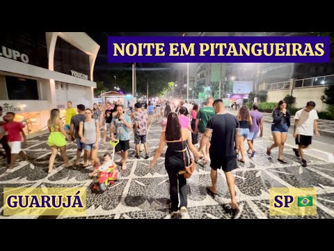 Sexta no calçadão da Praia de Pitangueiras (Guarujá, SP), shopping e feira de artesanato.