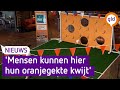 Een metershoge leeuw, en kunstgras in de winkel: Oranjegekte barst nu echt los