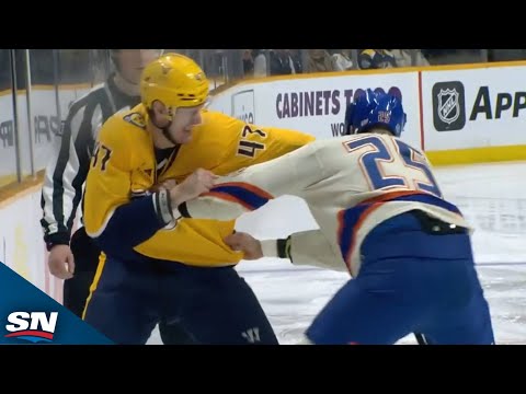 Oilers' Darnell Nurse And Predators' Michael McCarron Square Off After Opening Puck Drop