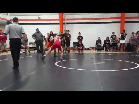 Adrien 8th grade wrestling pin