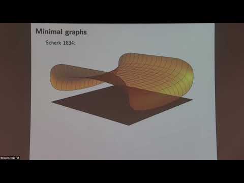 Bernstein's Problem and Regularity of Area-minimizing Hypersurfaces