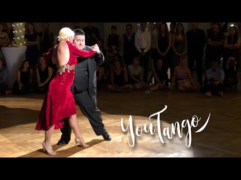  Alejandra Mantinan  and  Aoniken Quiroga  are  dancing  to  the  tango  "  Destino de Flor  "  by  Carlos di Sarli  at  Munich International Tango Festival  in  2019