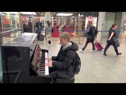 The most Insane Interstellar cover on a train station public piano