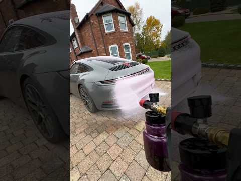 This Porsche covered in snow foam is unreal 😮‍💨 #satisfying #carcleaning #shorts