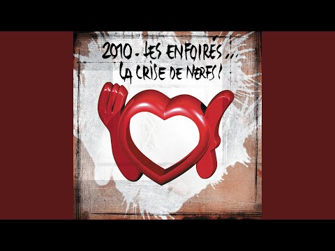 Videoclip de The Show Must Go On (Live Version) — Les Enfoirés