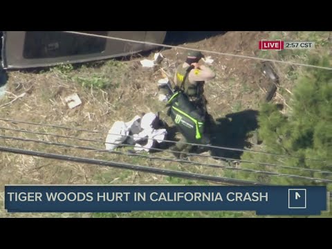 Tiger Woods golf clubs carried away from car accident