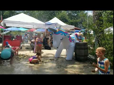 100° weather calls for a unicorn sprinkler doe the kids durning the music fest