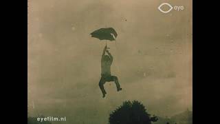 Gavroche vend des parapluies