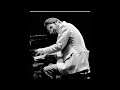 "Lucky To Be Me," a song by Leonard Bernstein as arranged for solo piano by Bill Evans