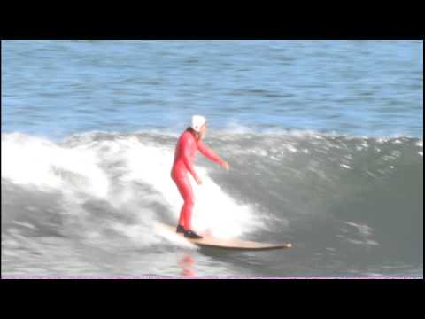 Kai Moku by Jim Kimo West, with longboard surfing