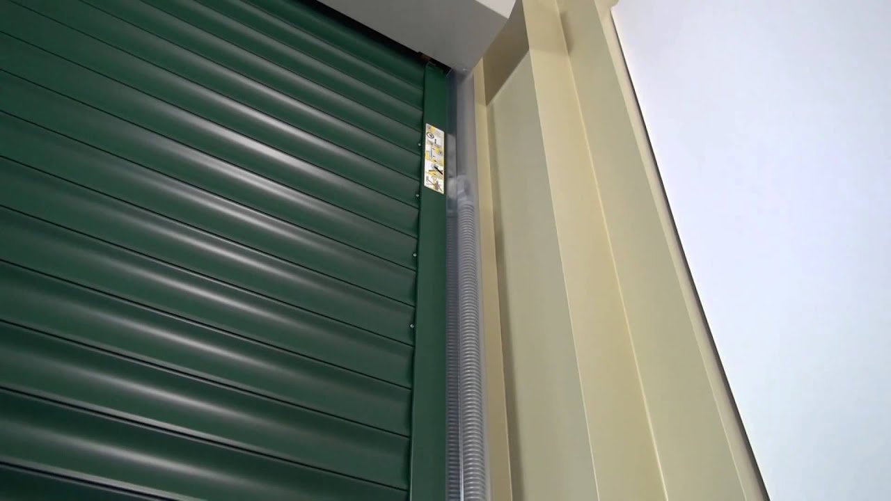 Watch video Gararoll Insulated Electric Roller Garage Door Now Gararoll Insulated Electric Roller Garage Door