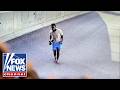 Fugitive Bolts Down Sidewalk As Agents Close In On Alleged Medicaid Fraud