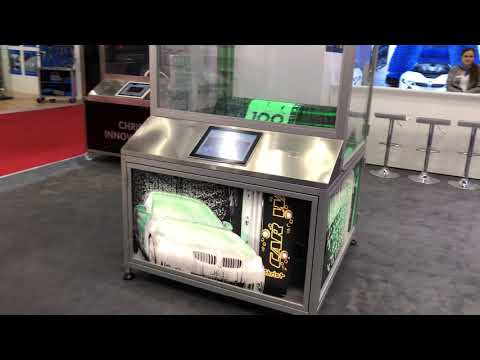 Trying out the Christ Touchless Car Wash demo at du Salon international de l'automobile Genève 2019