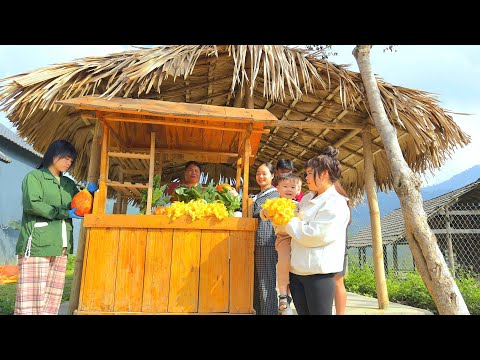 COI harvests fresh vegetables and gac fruit from his farm to sell.