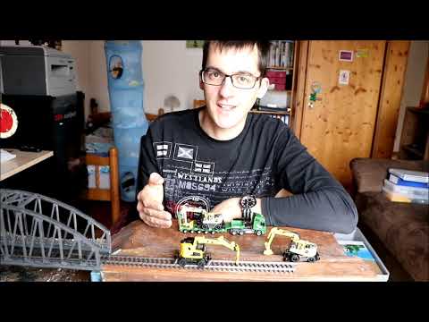 Christians Modellbahn gibt Weihnachtsinspiration - Zweiwegebaggervergleich Liebherr A922 - CAT M323F